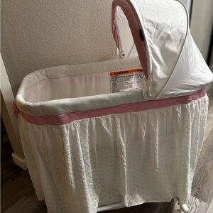 Charming Pink and White Baby Bassinet
